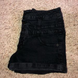 Black high wasted shorts in a size 9.